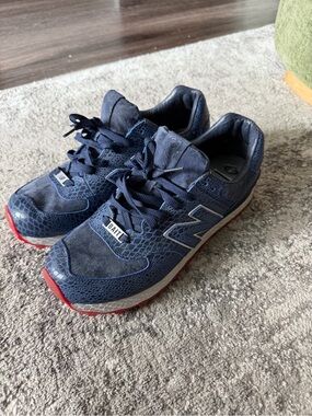 New Balance Men's Navy Athletic Sneakers with Red Accent